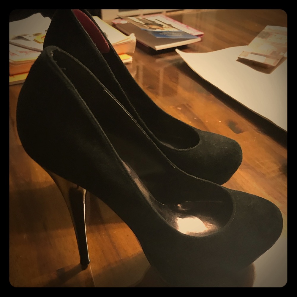 Black suede pumps
